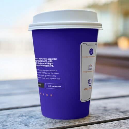 Modern blue coffee cup with digital graphics, illustrating tech solutions and innovation.